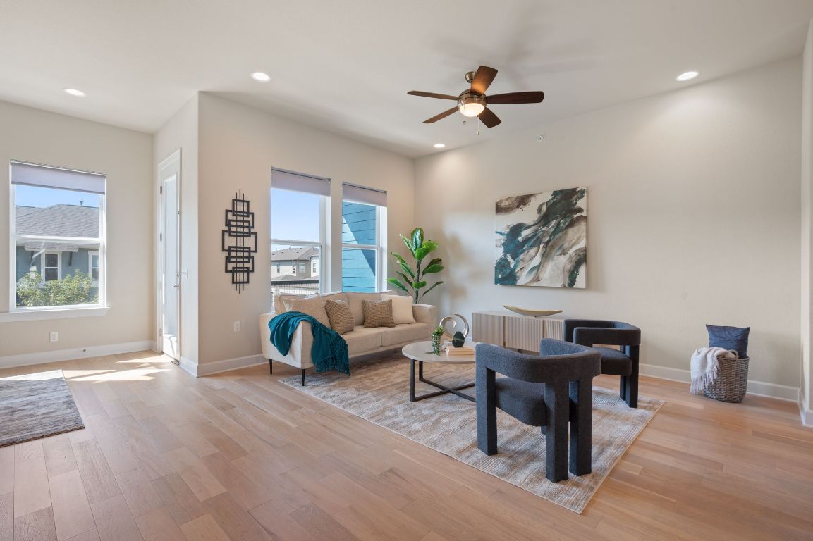 2510 Doc Reeves Street Austin, TX 78723 - Photo 8 of 39 a living room with furniture and a wooden floor