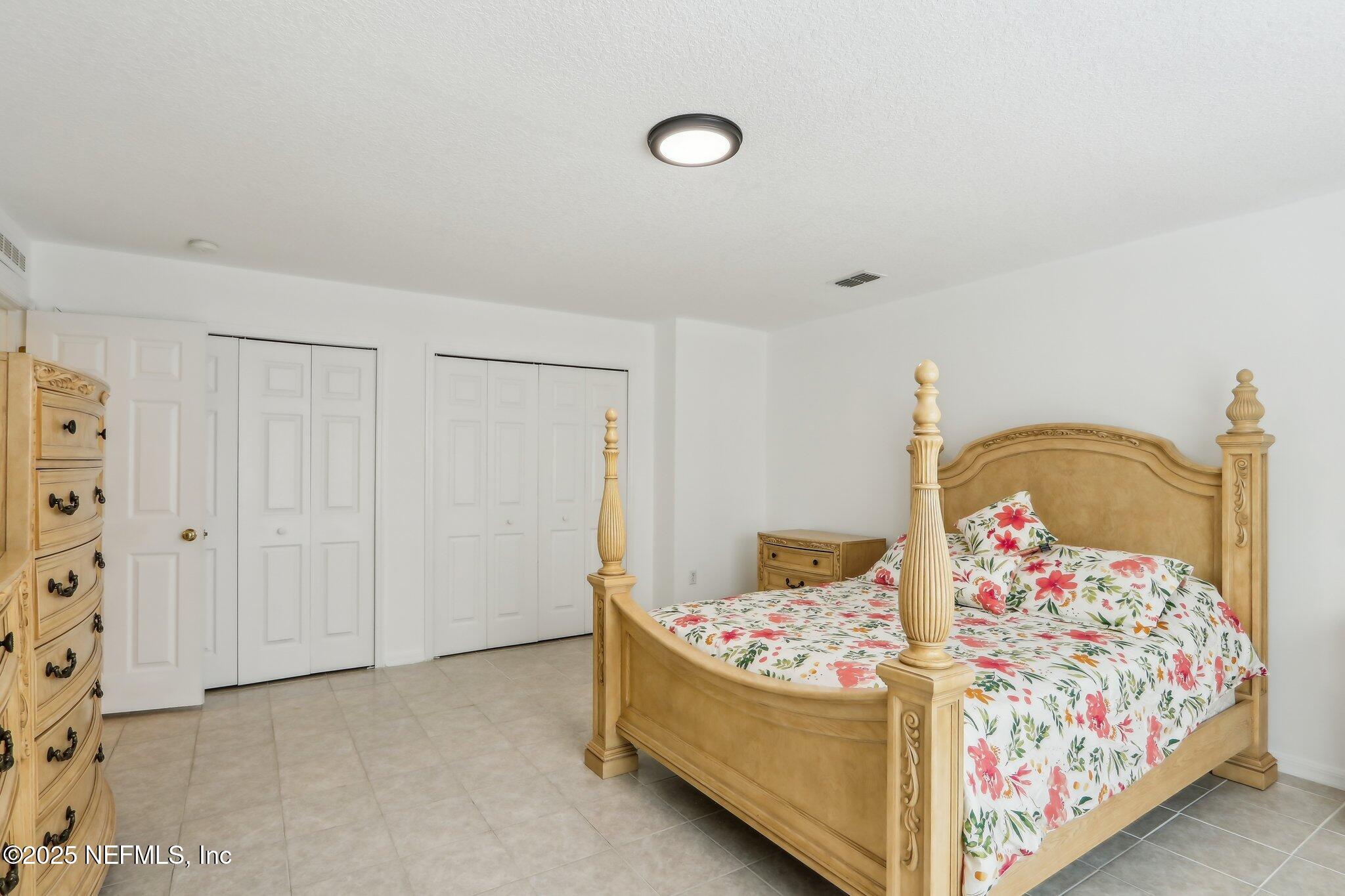 76391 Longleaf Loop Yulee, FL 32097 - Photo 19 of 58 Bedroom 1 Down STairs 3