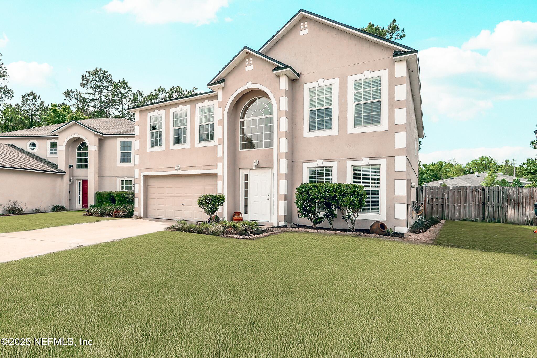 76391 Longleaf Loop Yulee, FL 32097 - Photo 3 of 58 Corner View Front Yard