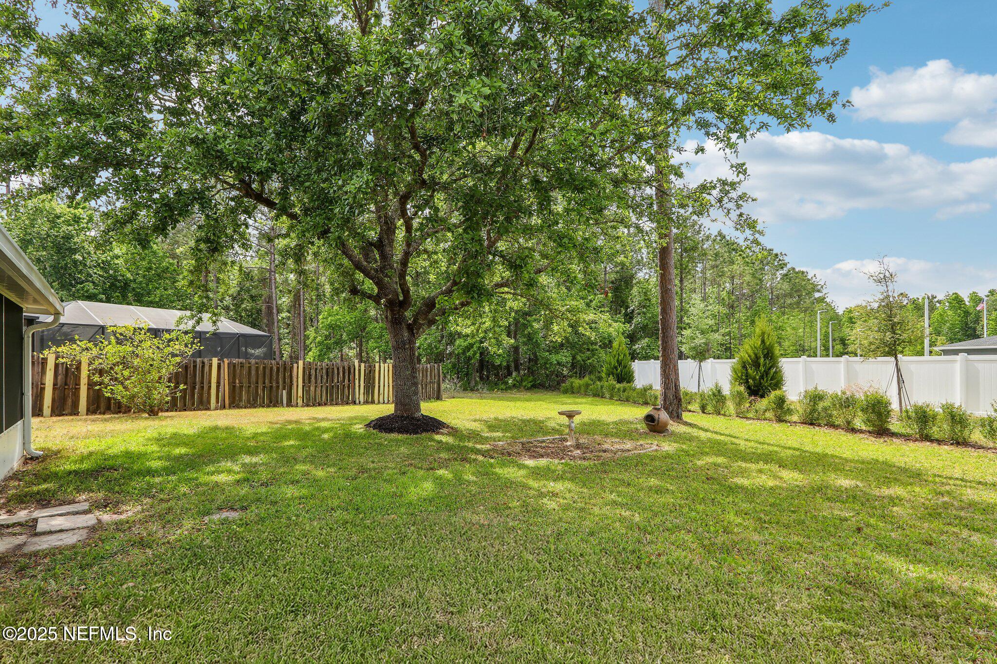 76391 Longleaf Loop Yulee, FL 32097 - Photo 42 of 58 back yard 1