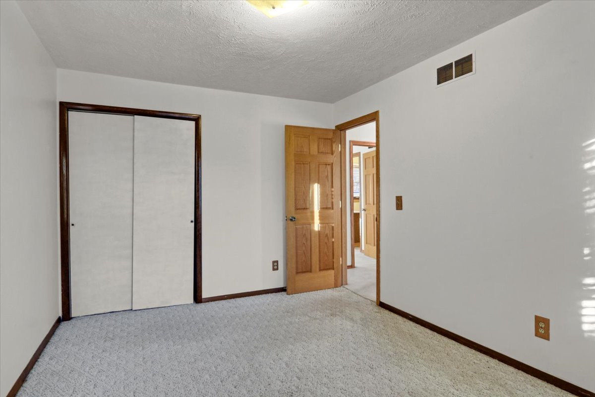 1720 Johnson Drive Normal, IL 61761 - Photo 11 of 23 an empty room with closet