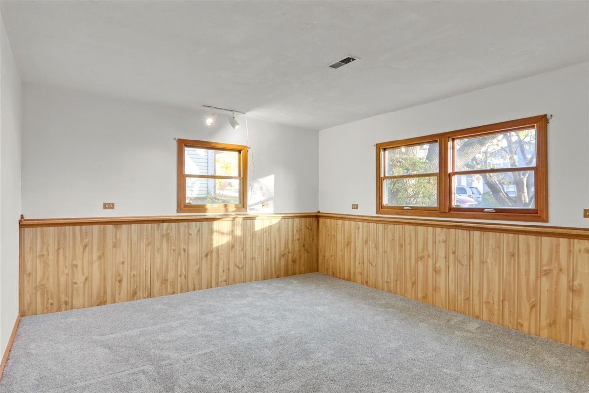 1720 Johnson Drive Normal, IL 61761 - Photo 15 of 23 an empty room with windows