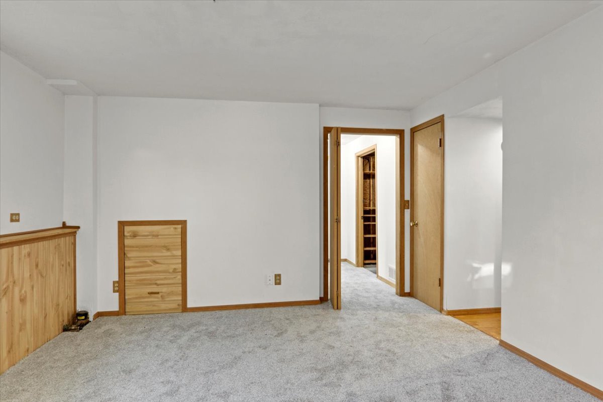1720 Johnson Drive Normal, IL 61761 - Photo 16 of 23 an empty room with closet