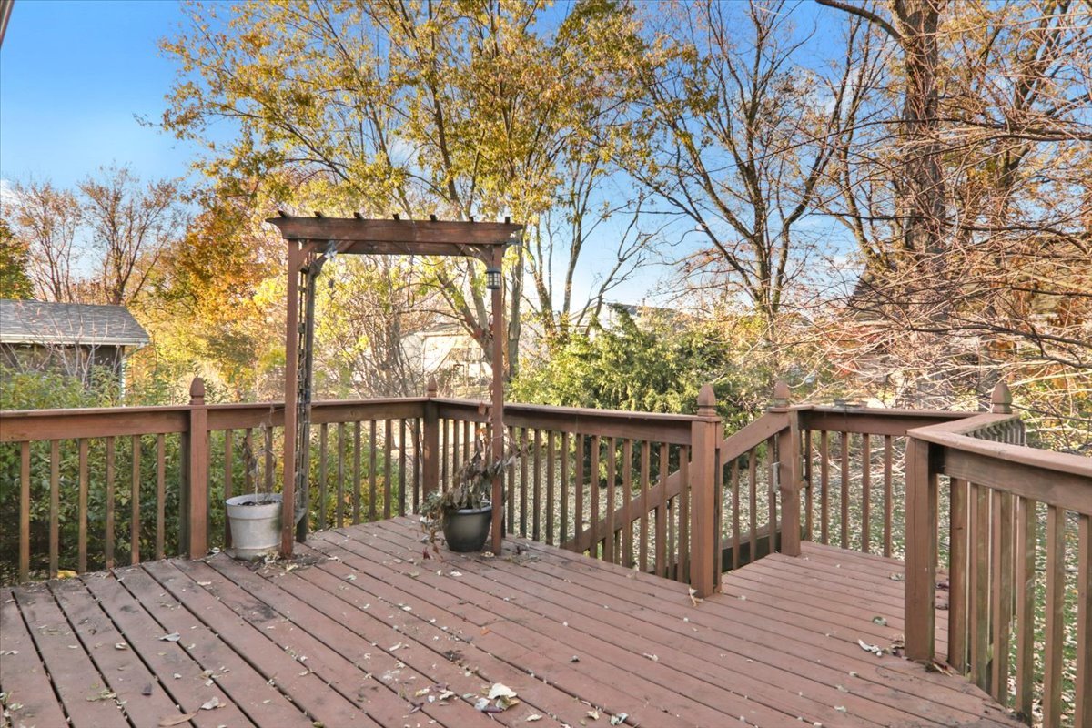 1720 Johnson Drive Normal, IL 61761 - Photo 20 of 23 a balcony with wooden floor and wooden fence