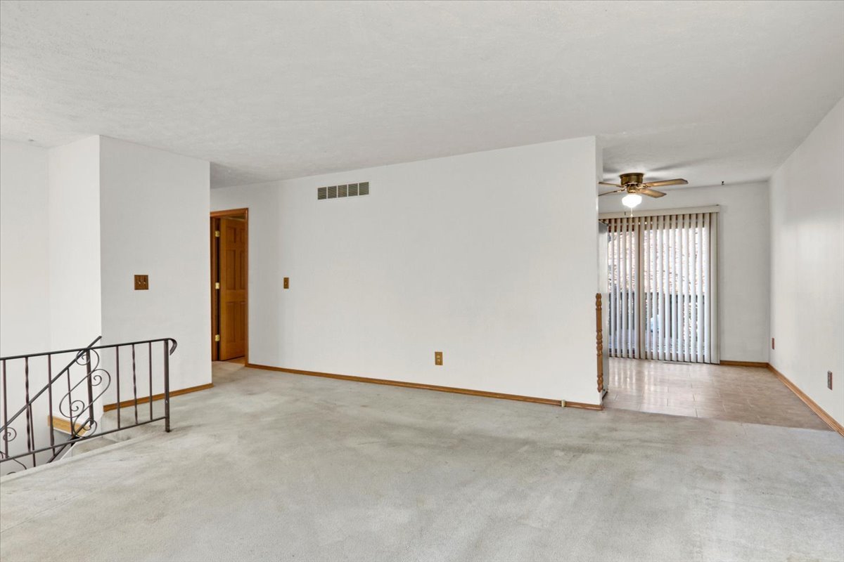 1720 Johnson Drive Normal, IL 61761 - Photo 3 of 23 an empty room with windows