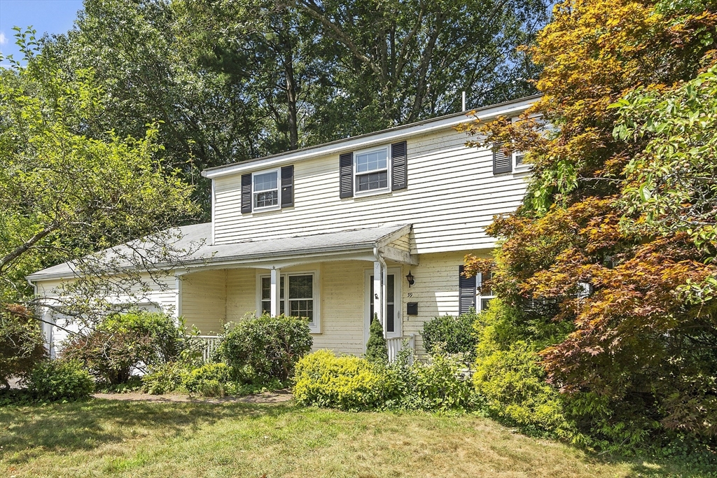 39 Winslow Street Concord, MA 01742 - Photo 1 of 22 a front view of a house with garden