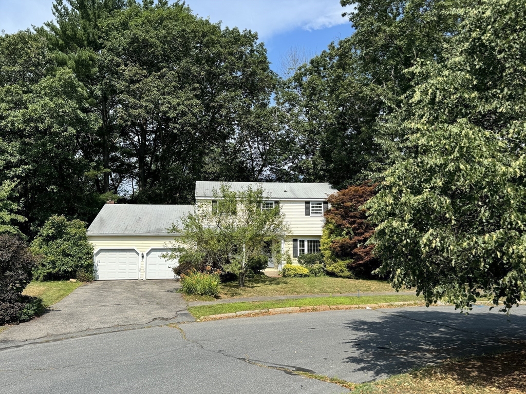 39 Winslow Street Concord, MA 01742 - Photo 2 of 22 a view of a house with a yard and large trees