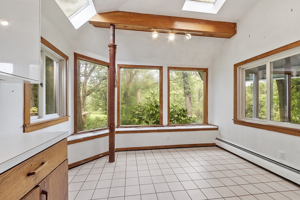 39 Winslow Street Concord, MA 01742 - Photo 4 of 22 a view of an empty room with windows