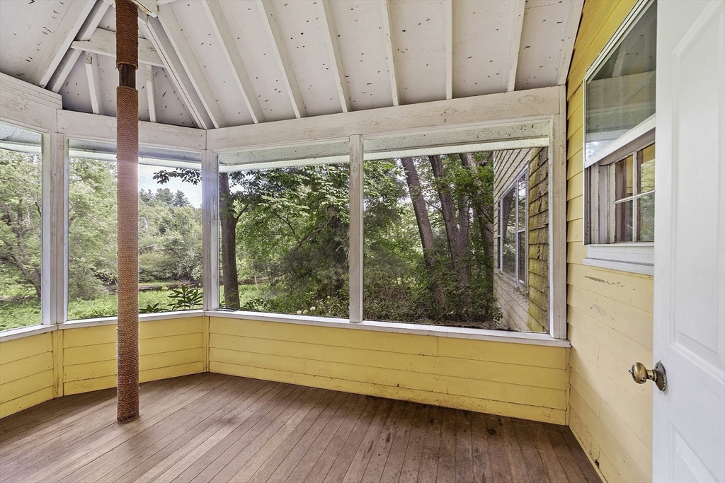 39 Winslow Street Concord, MA 01742 - Photo 6 of 22 a view of a room with wooden floor and windows