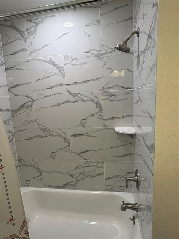 2110 Northwest 100th Street Ocala, FL 34475 - Photo 32 of 44 a bathroom with a shower