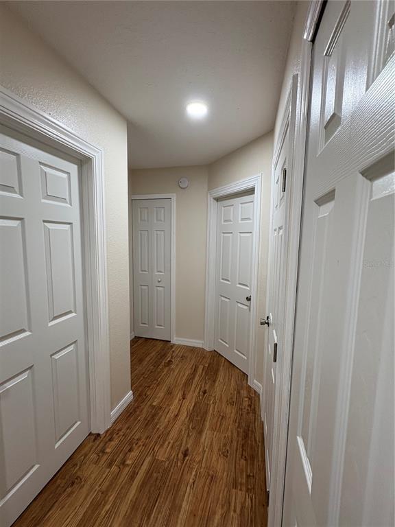 2110 Northwest 100th Street Ocala, FL 34475 - Photo 33 of 44 a view of hallway with wooden floor