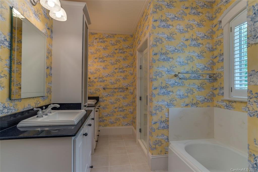 1322 Baber Road Rutherfordton, NC 28139 - Photo 14 of 24 a bathroom with a sink and a bathtub