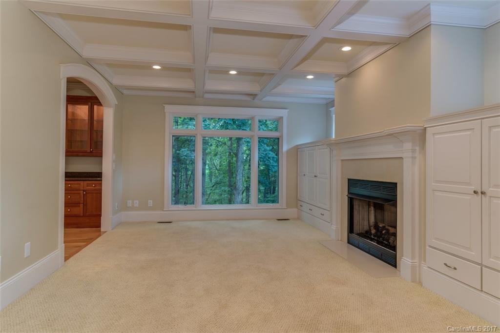 1322 Baber Road Rutherfordton, NC 28139 - Photo 8 of 24 a view of an empty room with a fireplace and a window