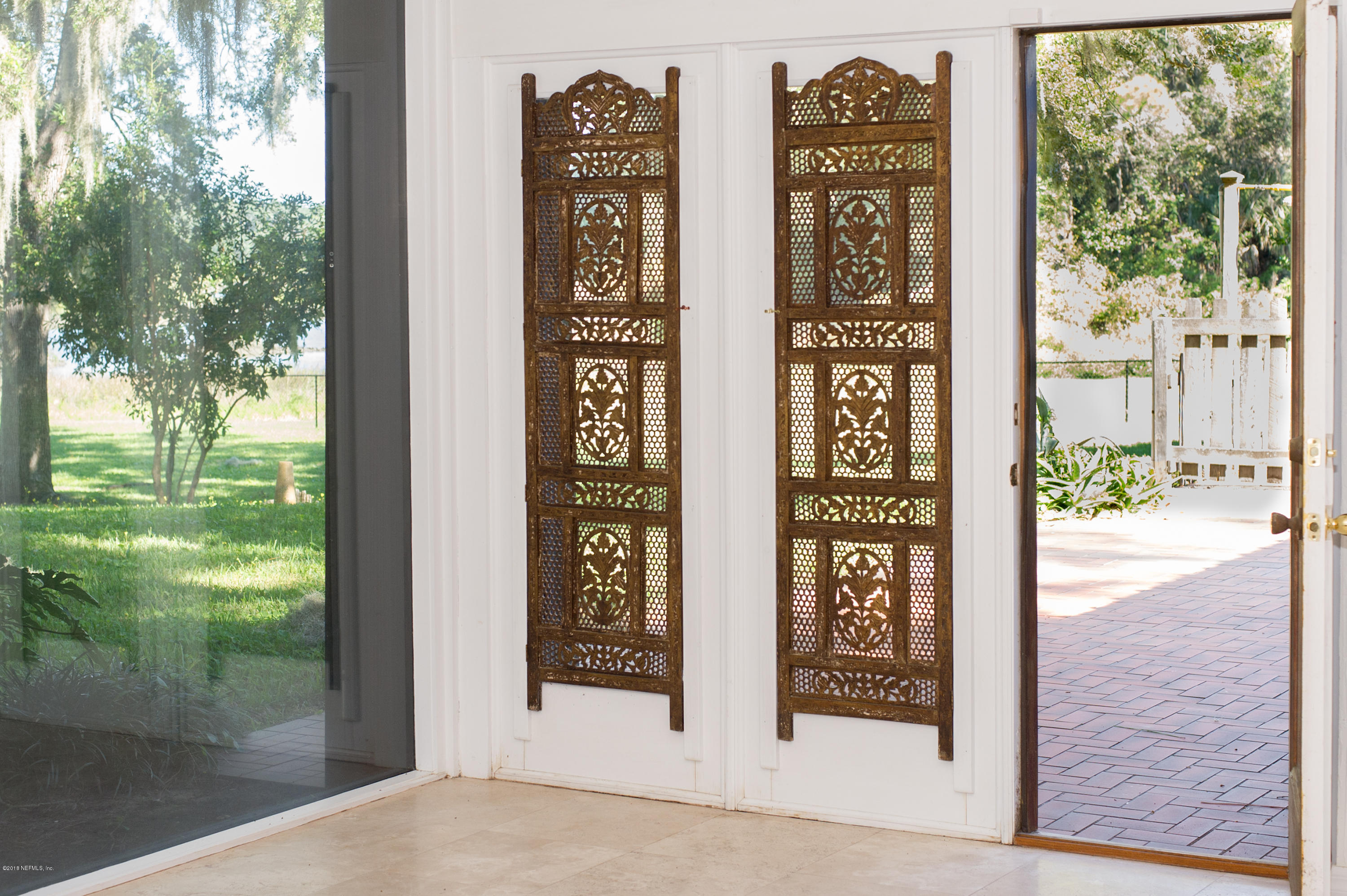 524 Vaill Point Road St. Augustine, FL 32086 - Photo 19 of 50 a view of a door with a street sign