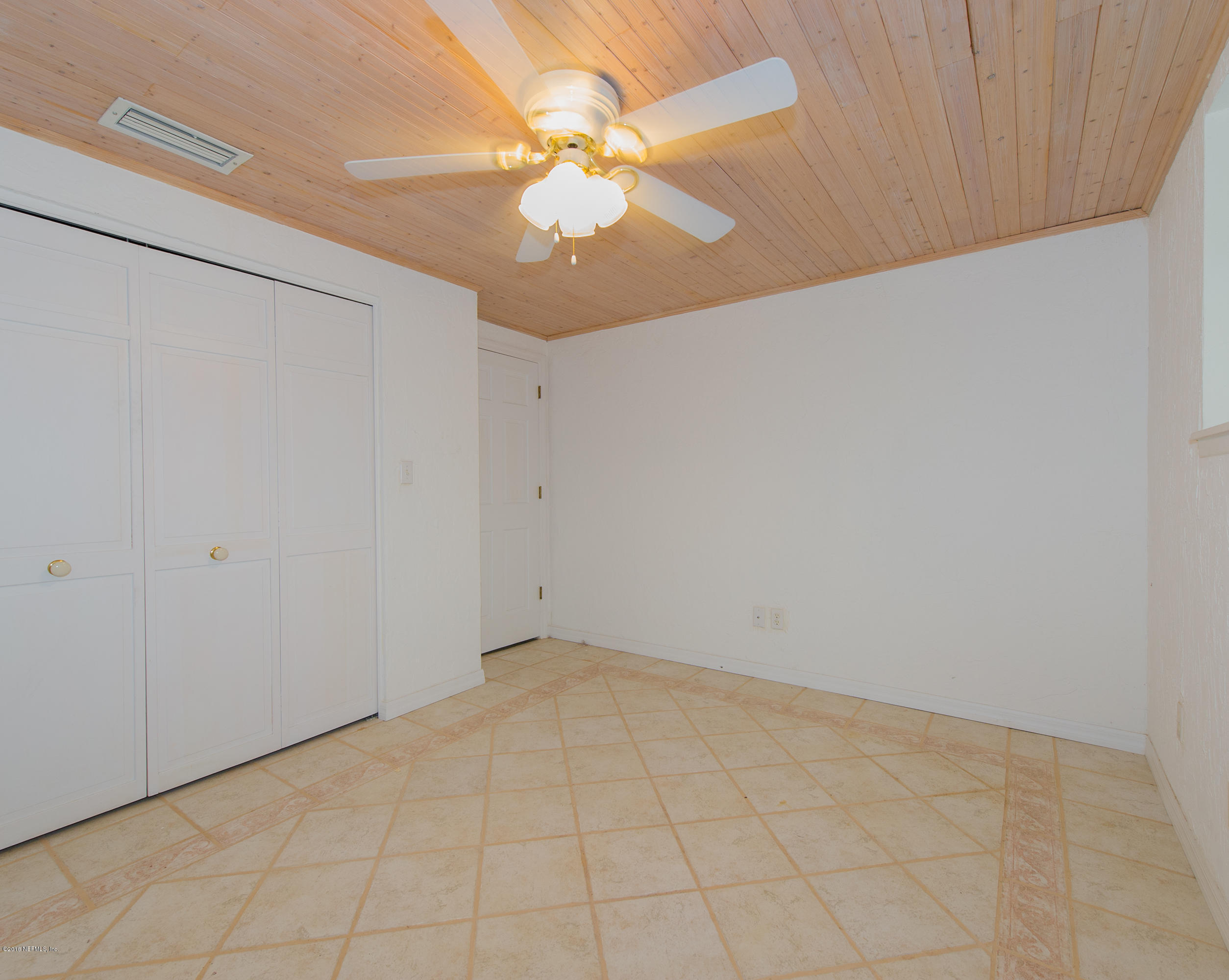 524 Vaill Point Road St. Augustine, FL 32086 - Photo 25 of 50 wooden floor in an empty room