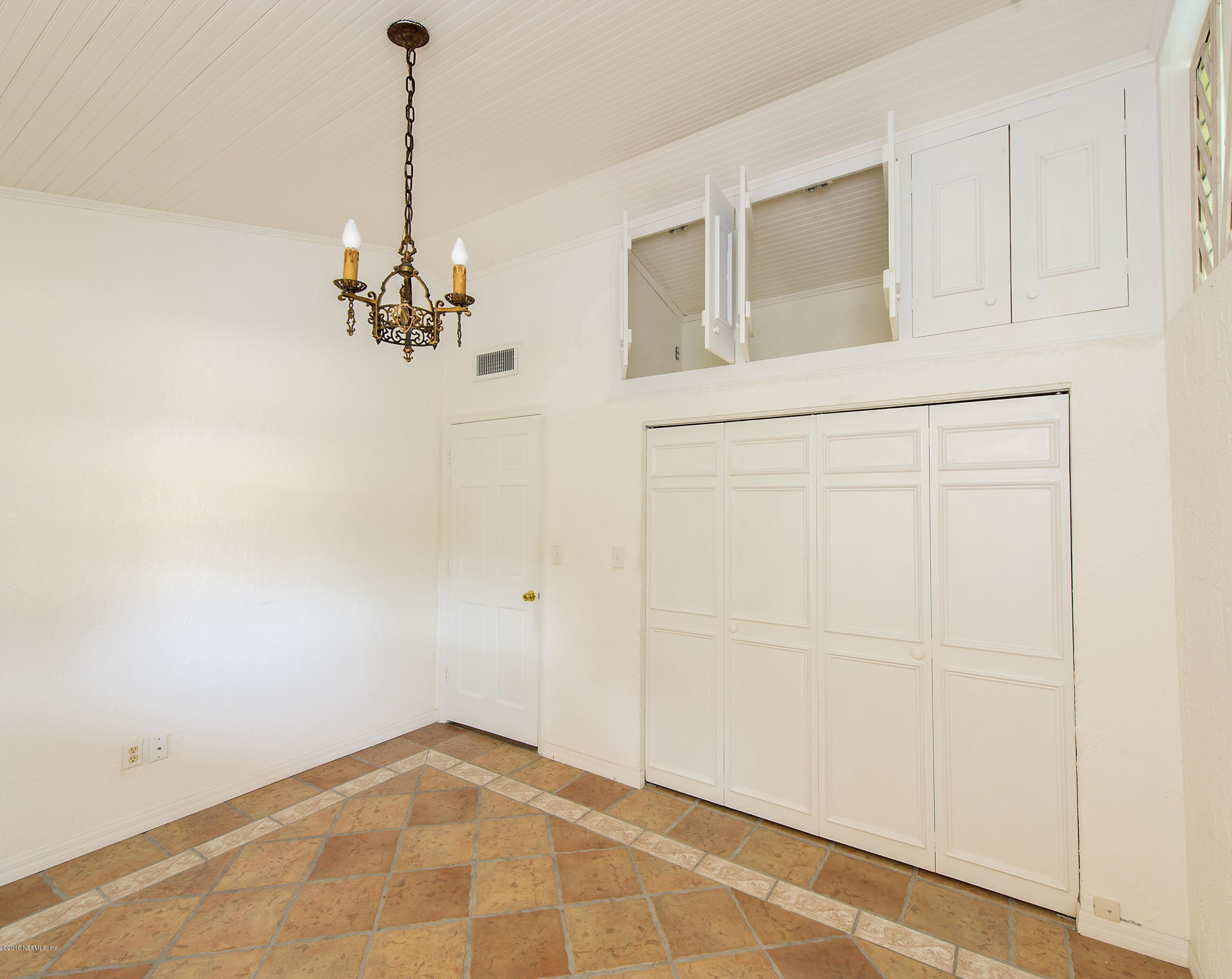 524 Vaill Point Road St. Augustine, FL 32086 - Photo 27 of 50 a view of a livingroom with a chandelier