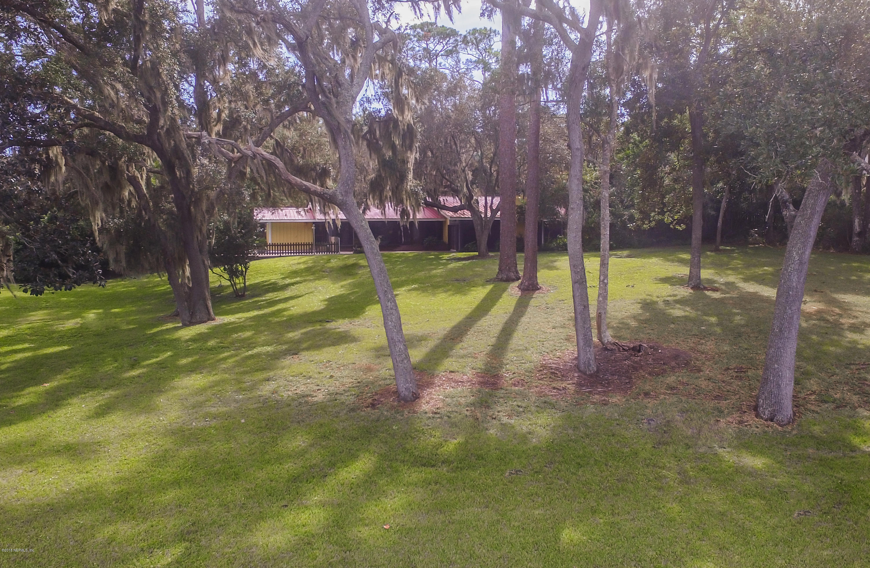 524 Vaill Point Road St. Augustine, FL 32086 - Photo 38 of 50 a view of a yard with swimming pool