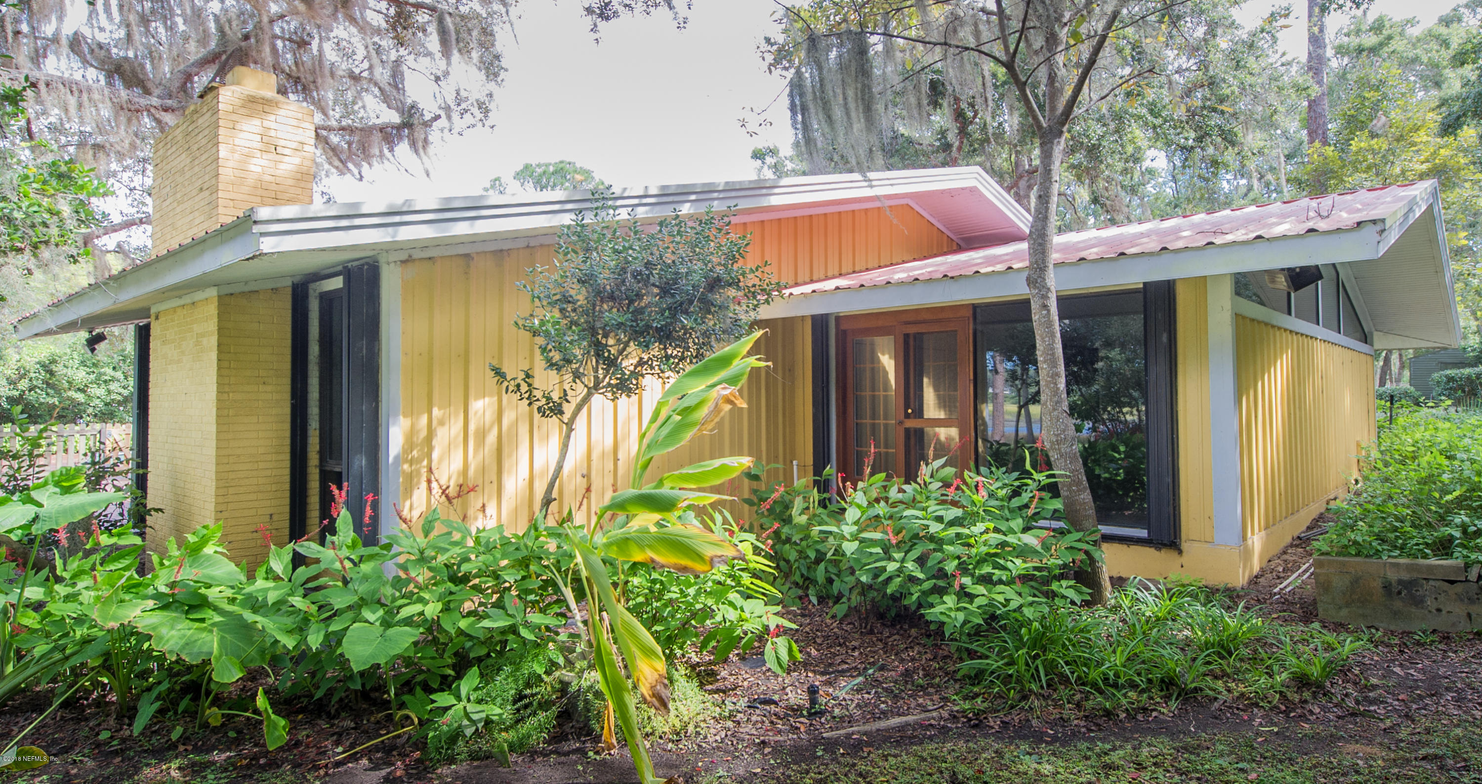 524 Vaill Point Road St. Augustine, FL 32086 - Photo 44 of 50 front view of house with potted plants