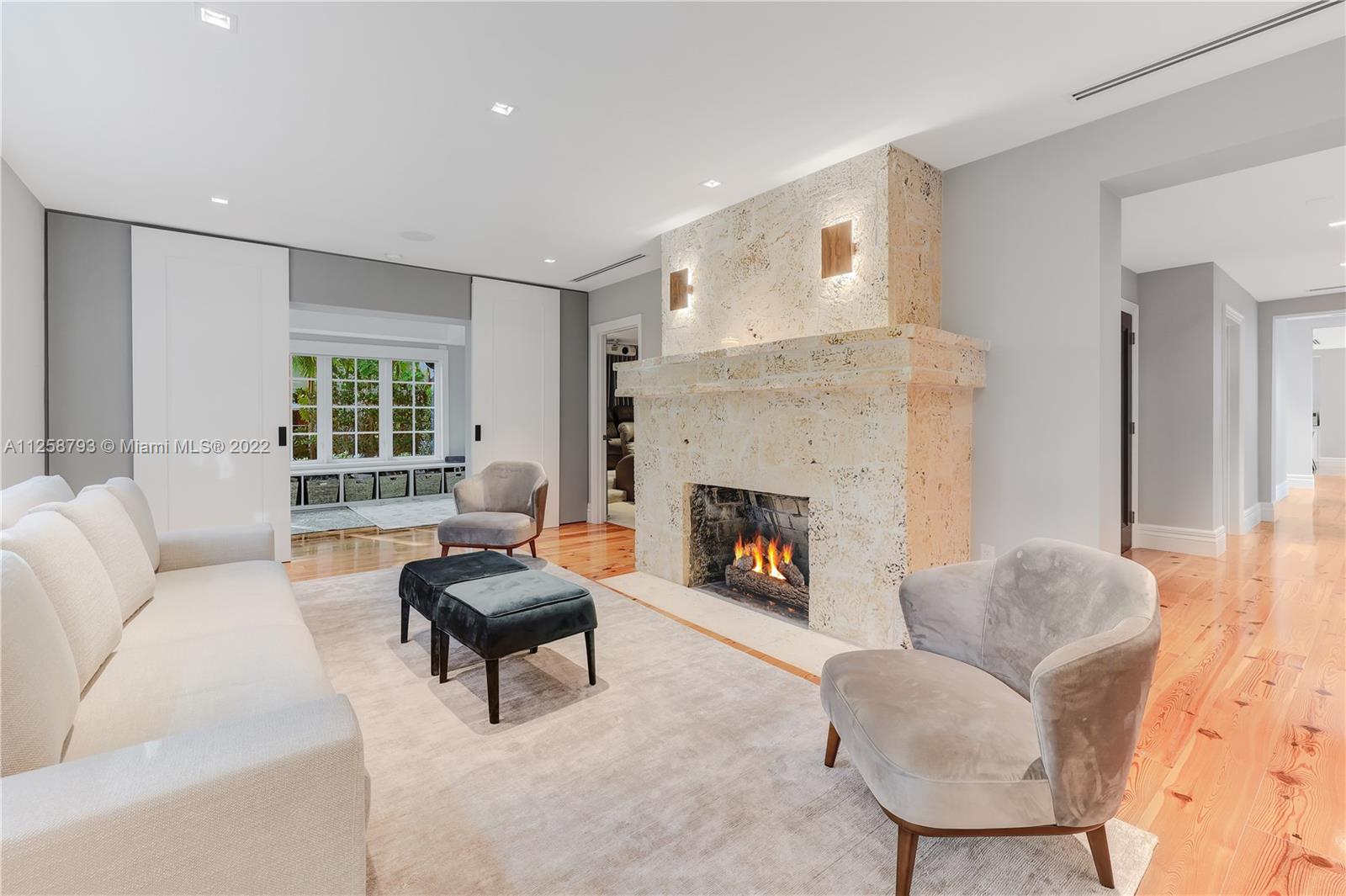 1311 Alhambra Circle Miami, FL 33134 - Photo 14 of 56 a living room with furniture and a fireplace