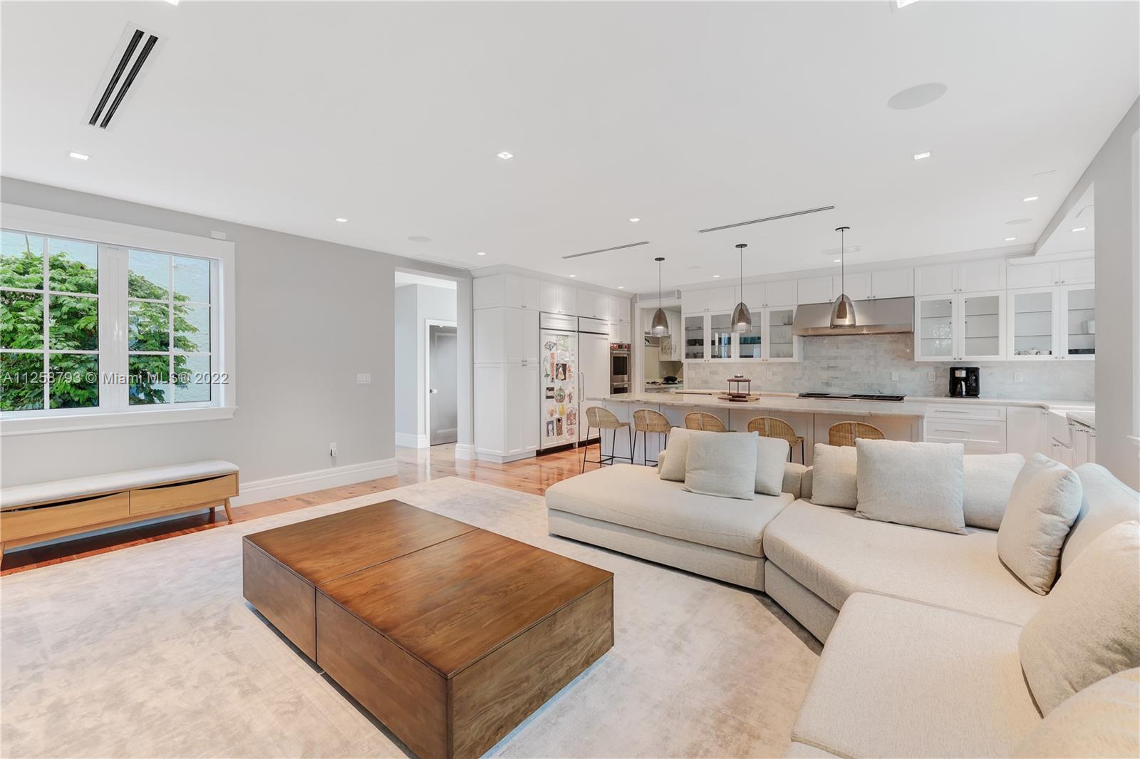 1311 Alhambra Circle Miami, FL 33134 - Photo 21 of 56 a living room with furniture and a large window