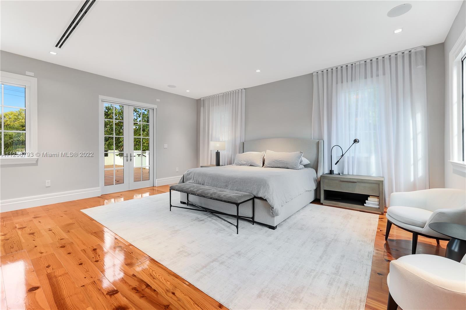 1311 Alhambra Circle Miami, FL 33134 - Photo 36 of 56 a bedroom with a bed and window