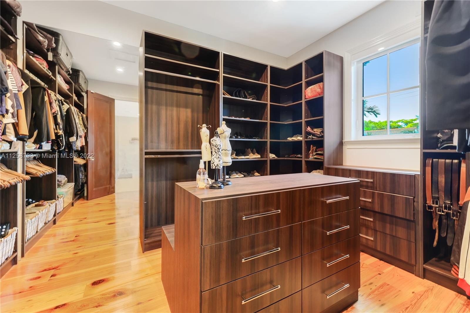 1311 Alhambra Circle Miami, FL 33134 - Photo 48 of 56 a kitchen with appliances cabinets and a sink