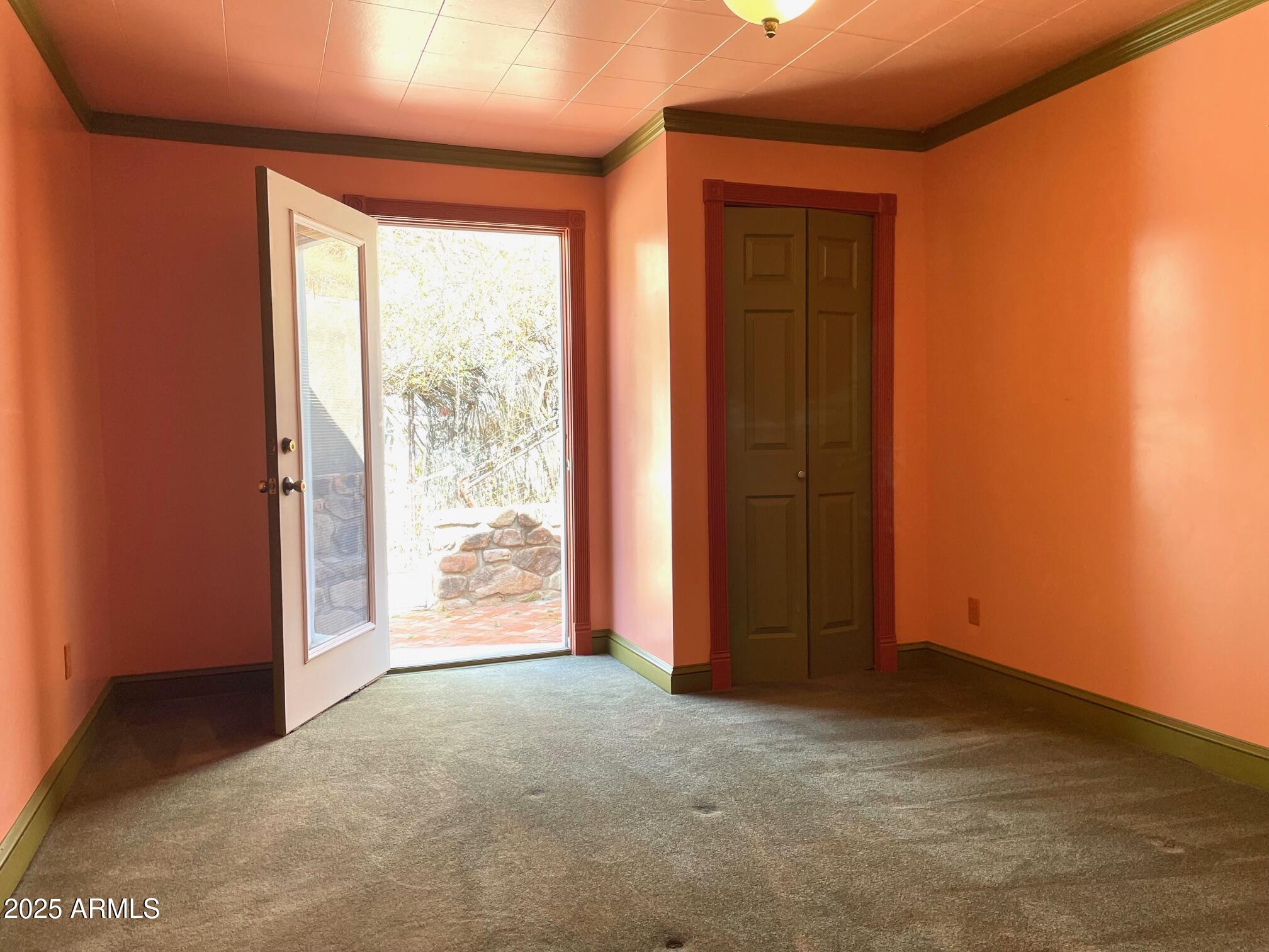 220 A Opera Drive Bisbee, AZ 85603 - Photo 24 of 46 an empty room with an entryway