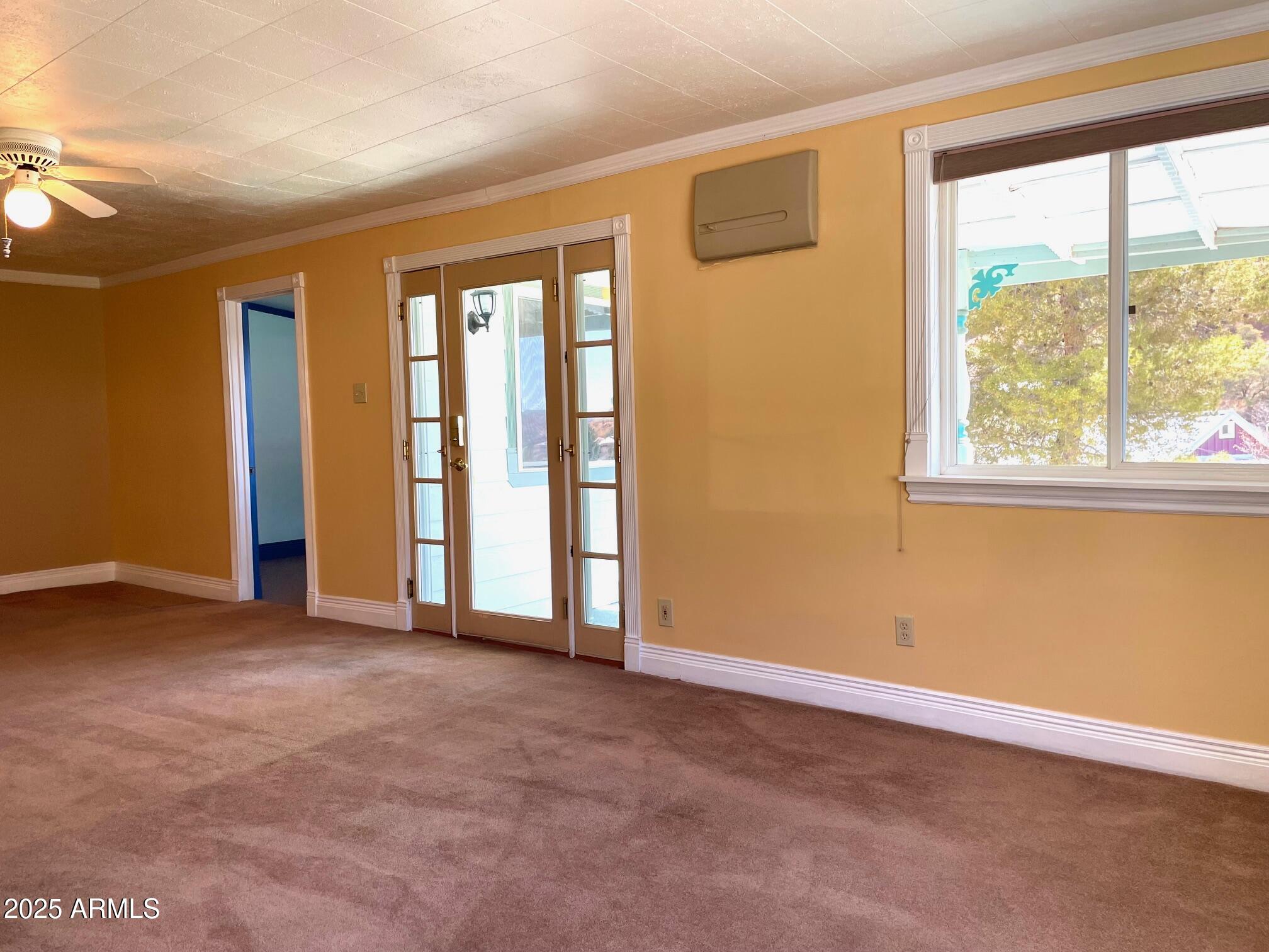 220 A Opera Drive Bisbee, AZ 85603 - Photo 30 of 46 an empty room with windows