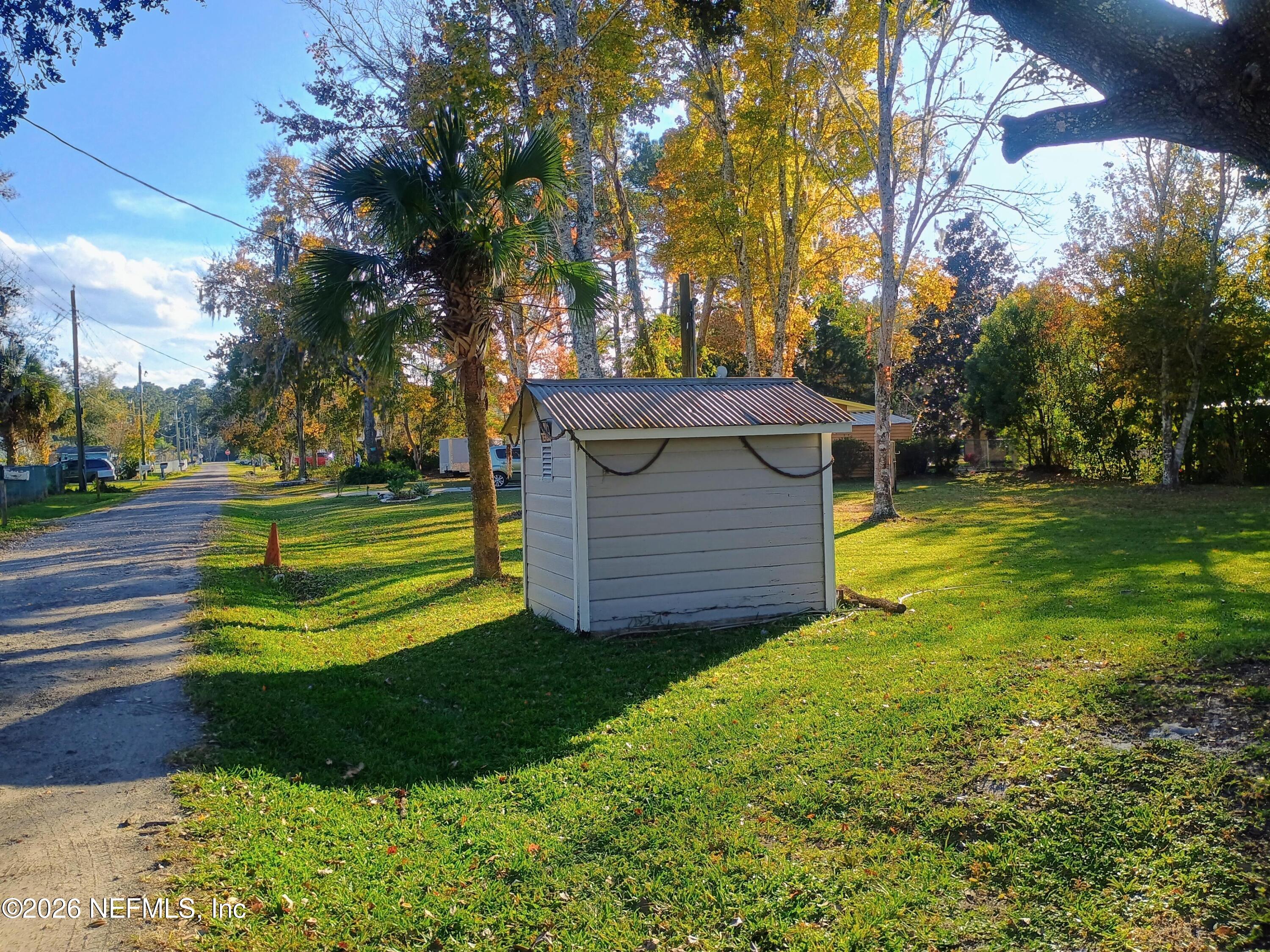 215 Pine Tree Trail Crescent City, FL 32112 - Photo 20 of 25 a view of a garden