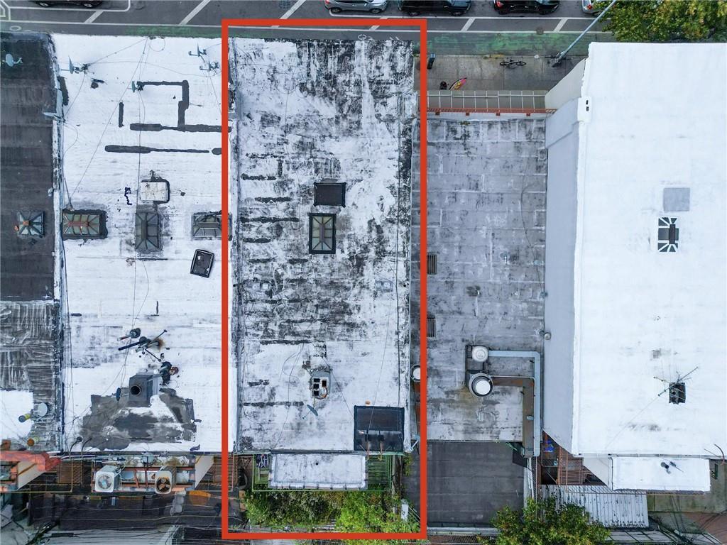 5813 4th Avenue Brooklyn, NY 11220 - Photo 21 of 25 a bathroom with a shower