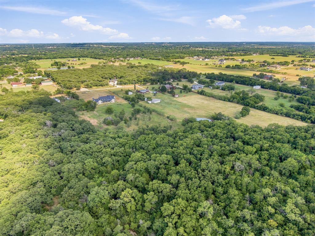 3325 Dove Creek Road Cleburne, TX 76031 - Photo 35 of 40 Expansive property encompassing significant wooded areas and open green spaces