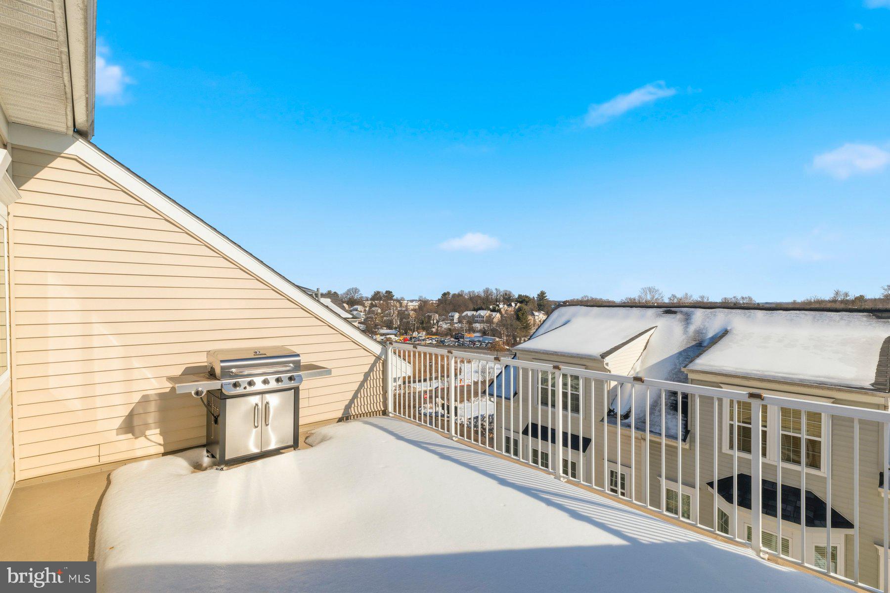 7205 Barry Lane Elkridge, MD 21075 - Photo 21 of 22 a view of a balcony with many windows