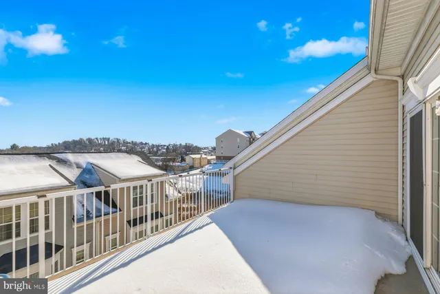 a view of a balcony with an outdoor space