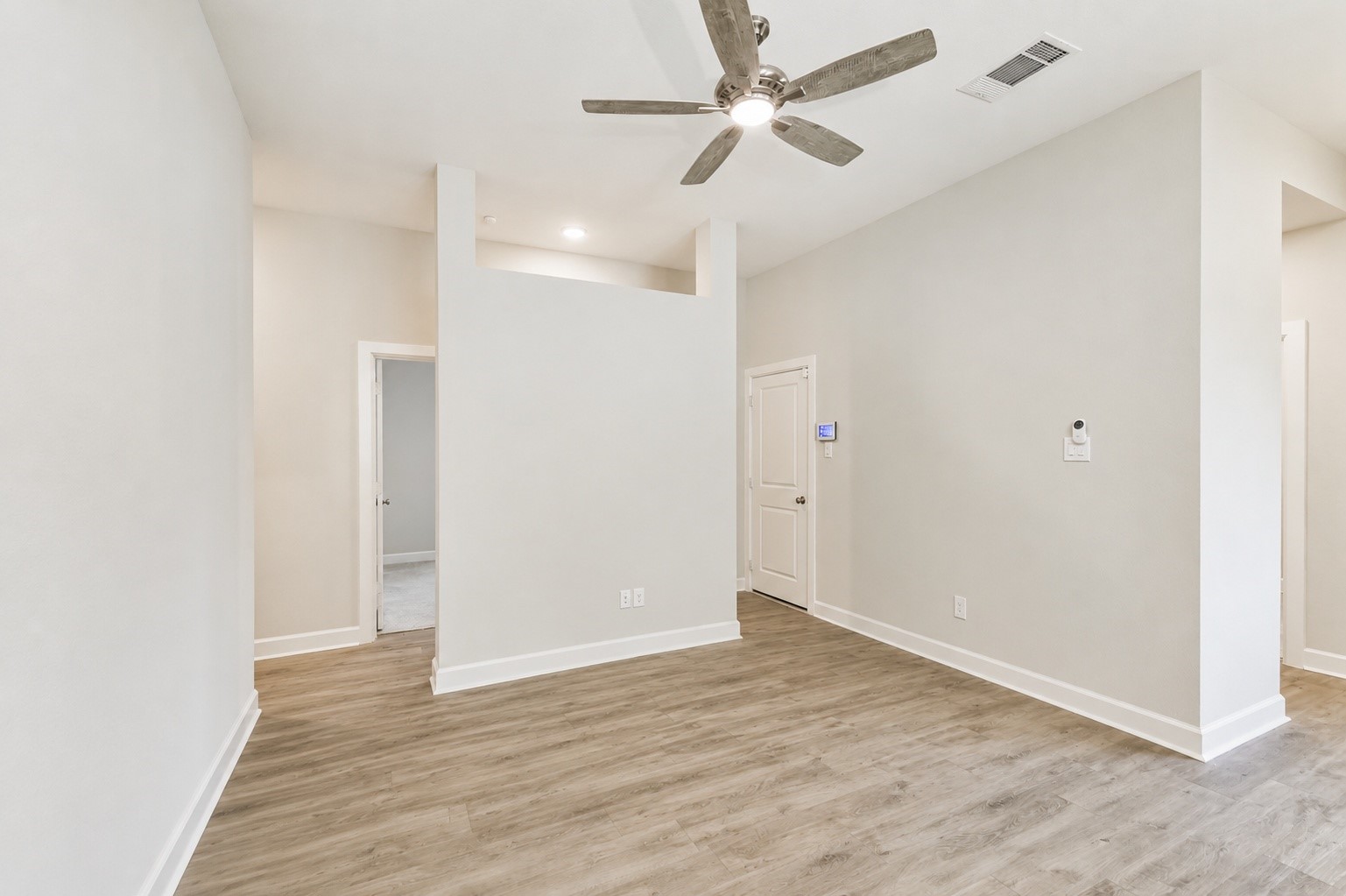 15611 Rising Wren Court Conroe, TX 77302 - Photo 6 of 38 wooden floor in an empty room