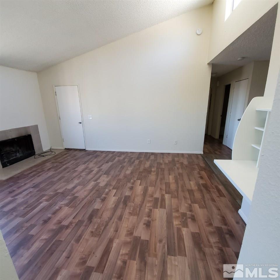 2085 Highview Court, Unit 4 Reno, NV 89512 - Photo 1 of 8 a view of wooden floor in an empty room
