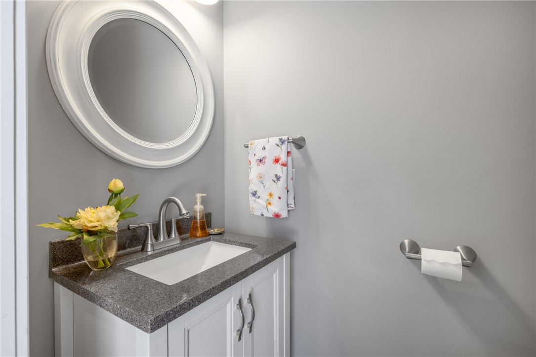 204 Riverlake Road Fair Play, SC 29643 - Photo 22 of 50 This bathroom features a contemporary vanity with a granite counter and a chic mirror.