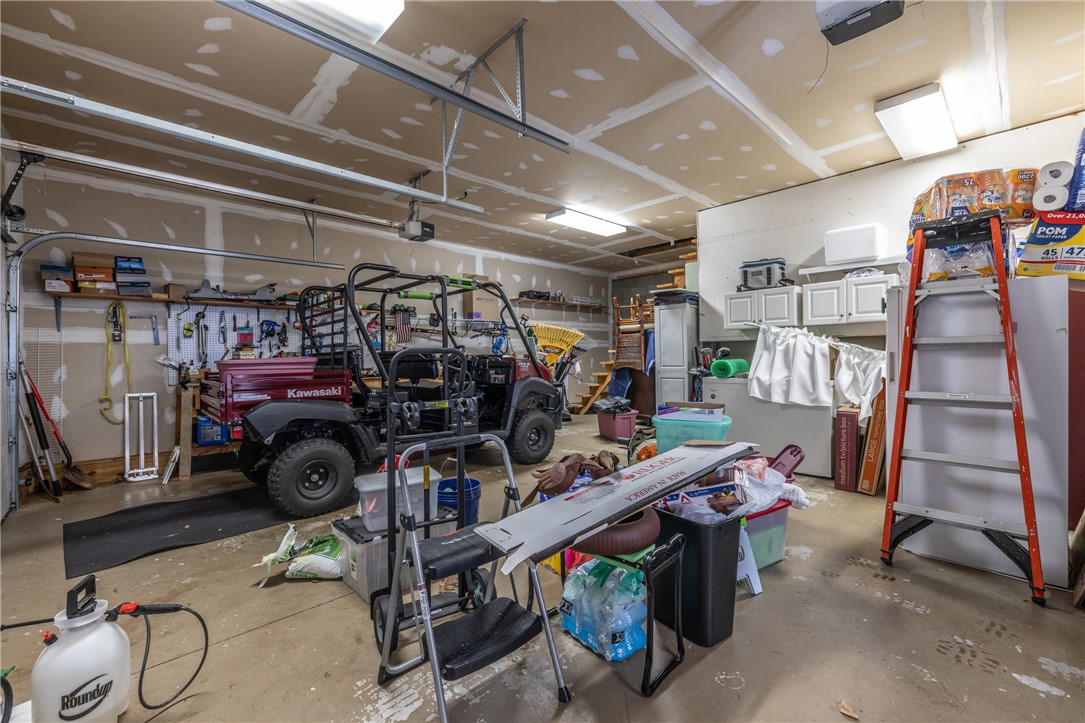 204 Riverlake Road Fair Play, SC 29643 - Photo 23 of 50 This spacious garage offers ample storage and direct access, perfect for all your needs.