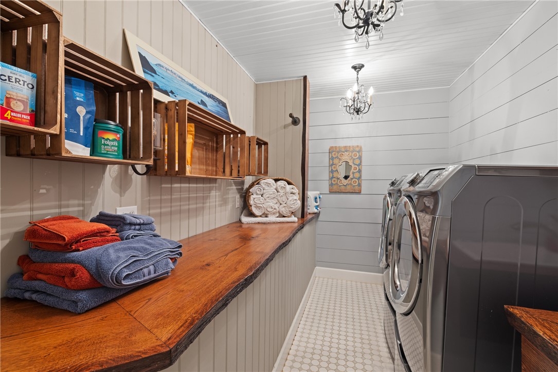 204 Riverlake Road Fair Play, SC 29643 - Photo 25 of 50 This thoughtfully designed space features efficient laundry facilities with ample counter space.