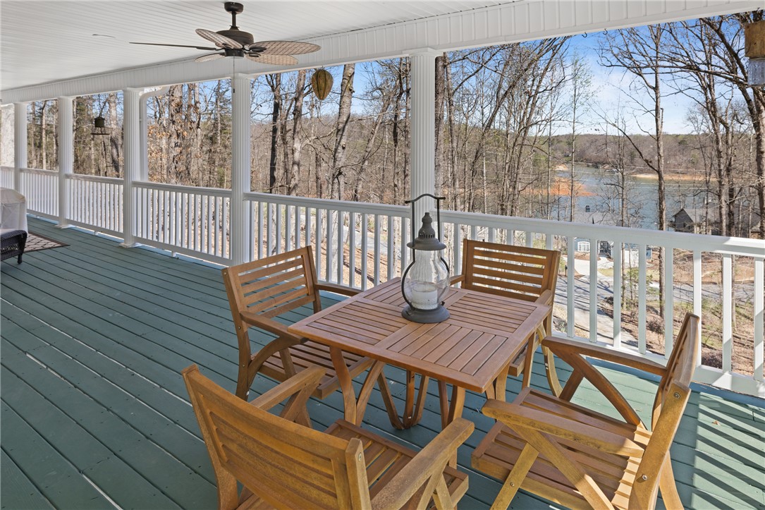 204 Riverlake Road Fair Play, SC 29643 - Photo 26 of 50 This spacious covered deck offers scenic views of the surrounding natural landscape and serene water.