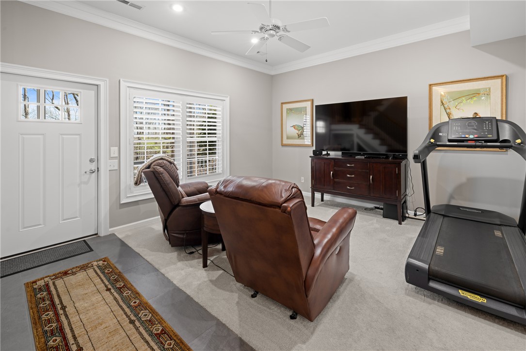 204 Riverlake Road Fair Play, SC 29643 - Photo 31 of 50 This versatile space offers comfort and convenience for relaxation or exercise.
