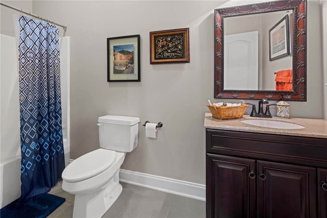 204 Riverlake Road Fair Play, SC 29643 - Photo 36 of 50 This bright bathroom features a vanity with granite counters and a shower for everyday comfort.
