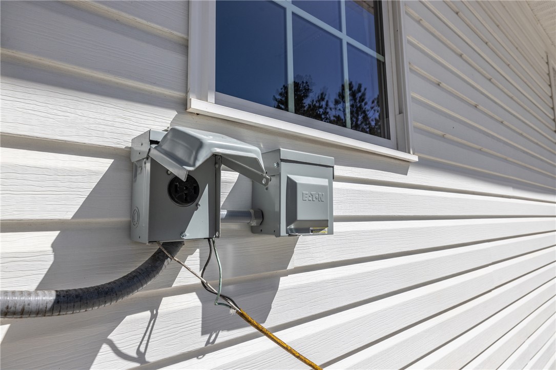 204 Riverlake Road Fair Play, SC 29643 - Photo 43 of 50 The home features sleek horizontal siding, enhancing its clean and contemporary appeal.
