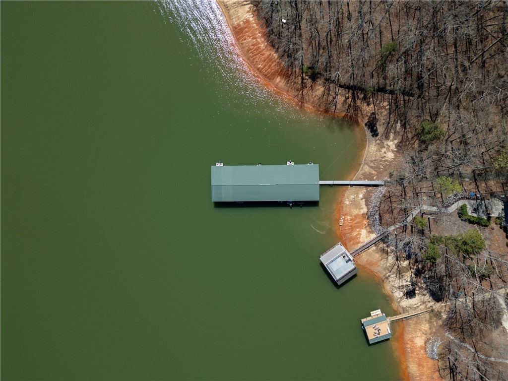 204 Riverlake Road Fair Play, SC 29643 - Photo 46 of 50 This aerial view showcases a picturesque waterfront property with a private dock and tranquil surroundings.