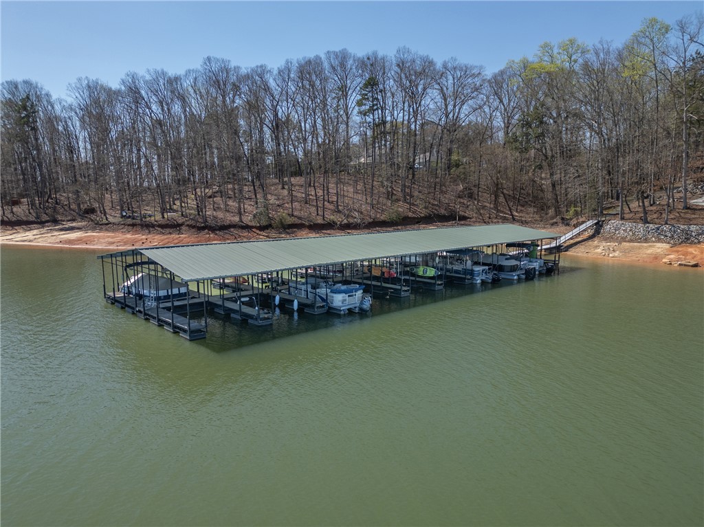 204 Riverlake Road Fair Play, SC 29643 - Photo 47 of 50 This spacious boat dock offers ample watercraft storage on a serene waterfront property.