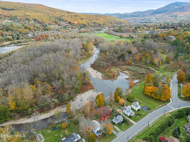 an aerial view of residential house with outdoor space