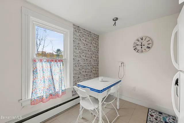 a view of a workspace with furniture