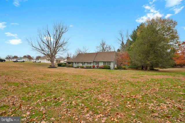 a view of a lake with a building in the background