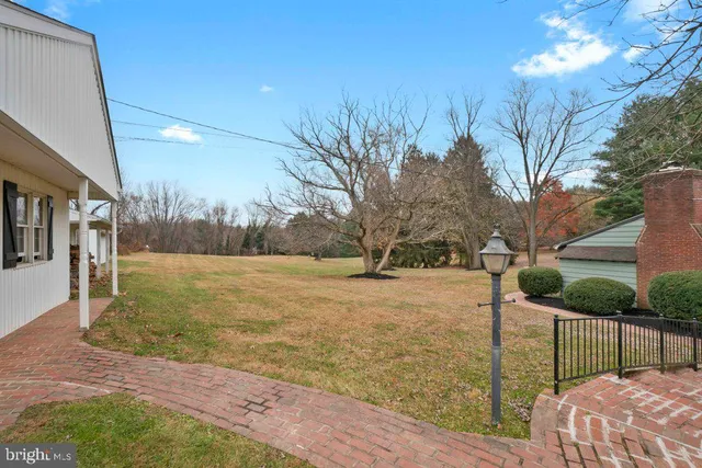 a house view with a garden space