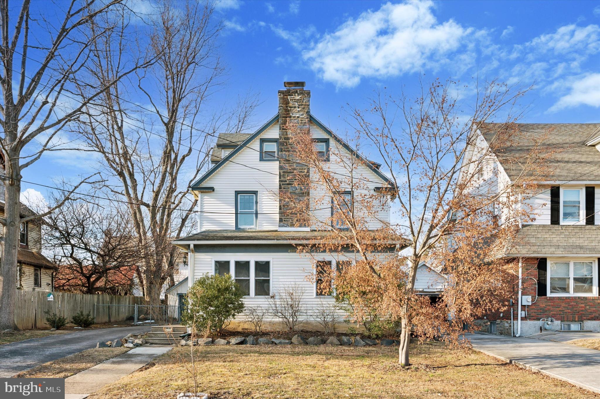 4009 State Road Drexel Hill, PA 19026 - Photo 2 of 26 a front view of a house with garden
