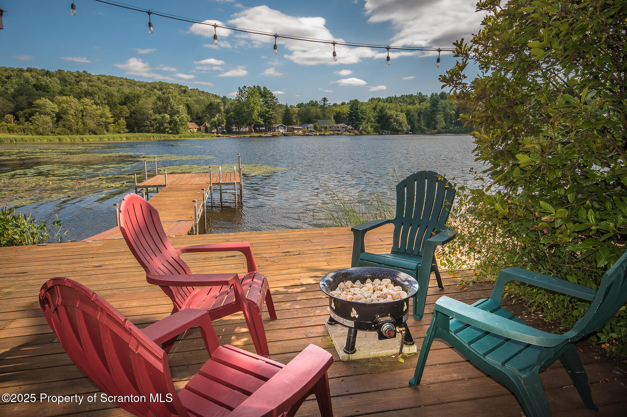 260 Baylors Lake Road Fleetville, PA 18420 - Photo 13 of 69 a view of a chairs and table in the patio